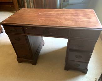 #42	Wood knee-hole Desk w/2 file Drawers & 5 Smaller Drawers (missing one drawer hardware)  as is finish on top - 44x22x29	 $50.00