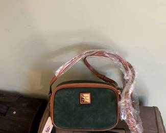 #109	Dooney & bourke Should Clutch Green w/Brown Trim	 $50.00