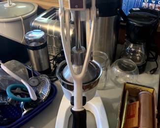 #102	Vintage Hand-press Juicer	 $30.00
