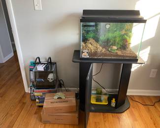 Aquarium with lid/light $60
Aquarium stand $60
Mini glass aquarium $40
Other aquarium accessories available. 