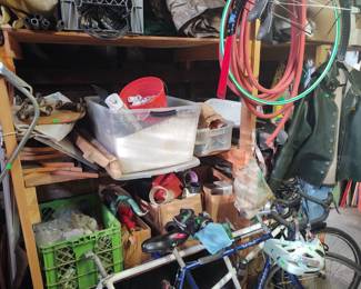 Lots of garden supplies High end tandem and road bike