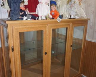 display cabinet, dolls