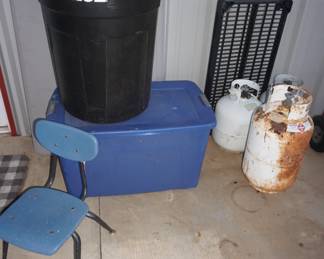 trash can, child chair, tub, propane tank