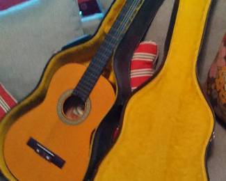Guitar in case “Conquerer”