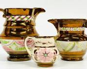 ANTIQUE HAND PAINTED COPPER LUSTER PORCELAIN CREAMERS
