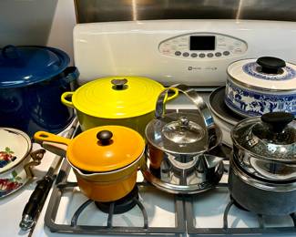 Nice selection of cookware including Le Creuset & enamelware