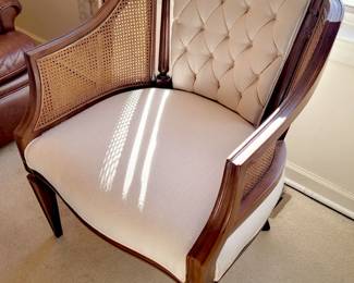 Vintage tufted chair with cane sides