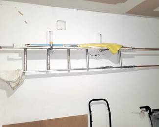 Ladder and gold umbrella