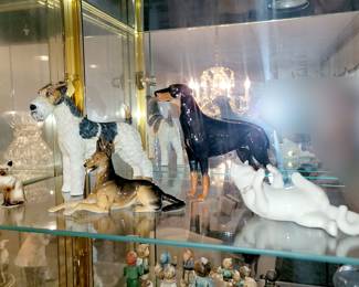 Porcelain dogs and cat figurines