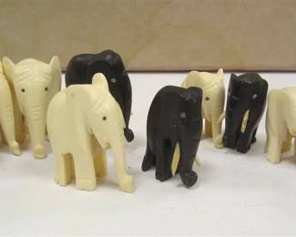 SET OF SMALL BONE AND WOOD ELEPHANTS