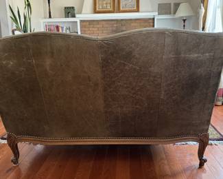 Louis XV-Style Full-Grain Moss Colored Leather Loveseat. Solid Maple Frame with Burnished Cherry Finish. Down-Filled Cushions. Measures 54" W x 33.5" H x 33.5" D. Photo 4 of 4.