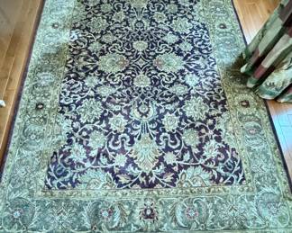 Area Rug with Sage & Eggplant Colorway. Measures 6' 4" x 9'. Photo 1 of 3.