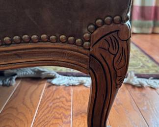 Louis XV-Style Full-Grain Moss Colored Leather Loveseat. Solid Maple Frame with Burnished Cherry Finish. Down-Filled Cushions. Measures 54" W x 33.5" H x 33.5" D. Photo 3 of 4.