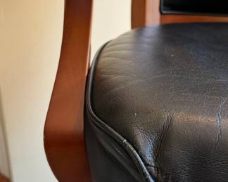 Set of 4 Brunswick Leather Upholstered Chestnut Finish Swivel Bar Stools with Copper Foot Rest Trim. 32" H Seat Height. Some Trim is Fraying on Seat. Photo 3 of 4.