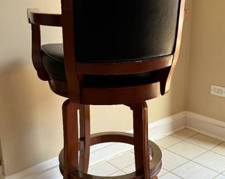 Set of 4 Brunswick Leather Upholstered Chestnut Finish Swivel Bar Stools with Copper Foot Rest Trim. 32" H Seat Height. Some Trim is Fraying on Seat. Photo 2 of 4.