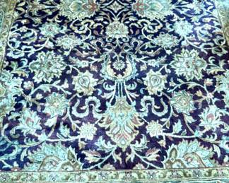 Area Rug with Sage & Eggplant Colorway. Measures 6' 4" x 9'. Photo 2 of 3.