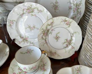 190+ piece "Rosalinde" set by Theodore Haviland - France. Includes large and small covered casseroles, 3 oval servers, 1 round server with handles, 1 gravy boat, coffee pot, cream & sugar, dinner plates, lunch plates, B&B plates, soup bowls, fruit bowls, coffee cups & saucers, demitasse & saucers