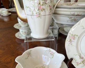 190+ piece "Rosalinde" set by Theodore Haviland - France. Includes large and small covered casseroles, 3 oval servers, 1 round server with handles, 1 gravy boat, coffee pot, cream & sugar, dinner plates, lunch plates, B&B plates, soup bowls, fruit bowls, coffee cups & saucers, demitasse & saucers