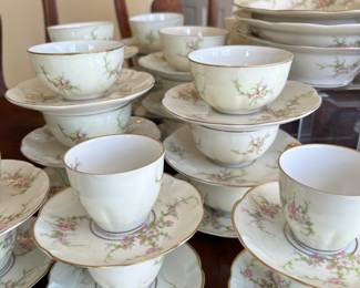 190+ piece "Rosalinde" set by Theodore Haviland - France. Includes large and small covered casseroles, 3 oval servers, 1 round server with handles, 1 gravy boat, coffee pot, cream & sugar, dinner plates, lunch plates, B&B plates, soup bowls, fruit bowls, coffee cups & saucers, demitasse & saucers
