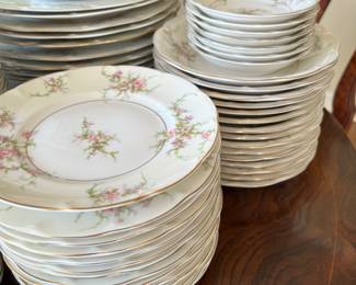 190+ piece "Rosalinde" set by Theodore Haviland - France. Includes large and small covered casseroles, 3 oval servers, 1 round server with handles, 1 gravy boat, coffee pot, cream & sugar, dinner plates, lunch plates, B&B plates, soup bowls, fruit bowls, coffee cups & saucers, demitasse & saucers