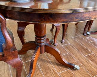 Large antique Duncan Phyfe-style dining table with two leaves (only one is shown) and eight chairs. Chair bottoms easily removed to recover.