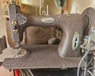 White antique sewing maching