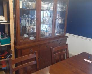 China Cabinet with Lighted Display area. Excellent Condition!
This cabinet overall is: 68-3/4" wide, 18-1/4" deep and 81-1/2" tall.
The top glass lighted display comes apart from the cabinet base for easy moving.