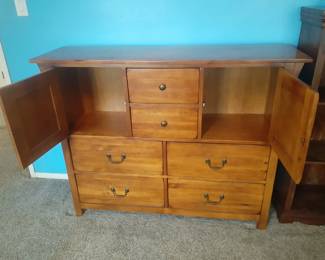 Dresser with a total of 6 drawers and 2 compartments. 
57-1/2" wide, 17" deep and 45" tall.