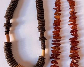 2 Necklaces: Natural Amber & Wood
Lot #: 142