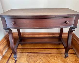 Vintage Solid Wood Writing Desk On Caster Wheels With Drawer
Lot #: 35