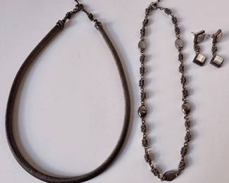 2 Michael Dawkings 925 Sterling Silver Neckalces, Including Mother Of Pearl With Matching Earrings
Lot #: 144