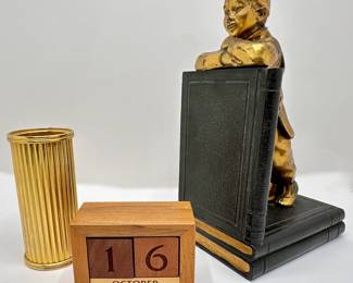 Ronson Gold Tone Metal Book End Of Chinese Boy, Wood Desk Calendar & Pen Holder
Lot #: 177