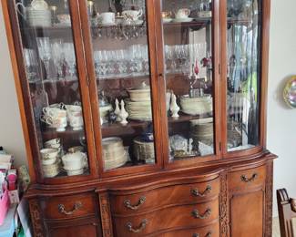 Absolutely gorgeous antique china cabinet. Comes apart in 2 pieces for moving. Curved glass corner pieces. Base is 60 wide x 29 1/2 tall x 19 deep. Top is 60 x 48 x 16. Available for pre-sale $295