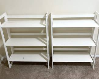 Two White Collapsible Bookshelves