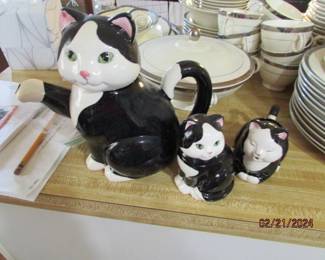 pitcher, creamer and sugar