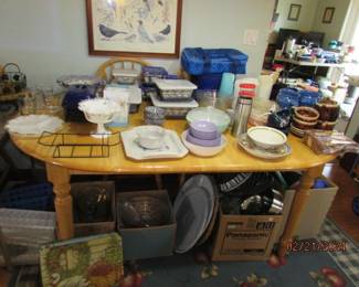 Kitchen table with leaf/4 chairs                                           bakeware and assorted kitchen items