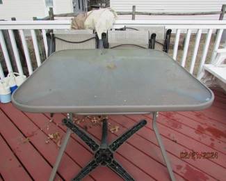 glass top table and 4 chairs