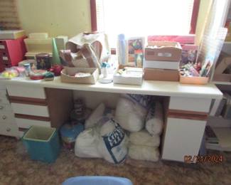 desk, various sewing and craft supplies