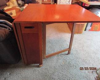 view of the side of the Romanian gate leg table