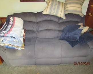 recliner couch, pillows, quilts