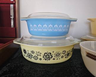 Top:  Blue Pyrex White Tulip Casserole Dish            
Bottom: 1957 Vintage Pyrex Pressed Flowers Casserole Dish