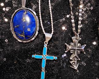 Going from Left to Right
Large Lapis Stone
Turquoise cross 
Vintage Discontinued James Avery 