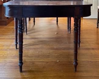 Antique Sheraton Demi-Lune with Faux Bamboo Legs - 2 Available. Each Measures 42" W x 21" D x 29" H.