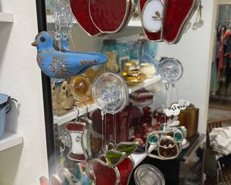 Very old stained glass window decorations.  They are really cute.  Perfect for catching rays.