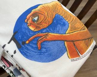 ET phone home. T-shirts are 20% off. 