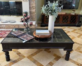 Carved wood coffee table