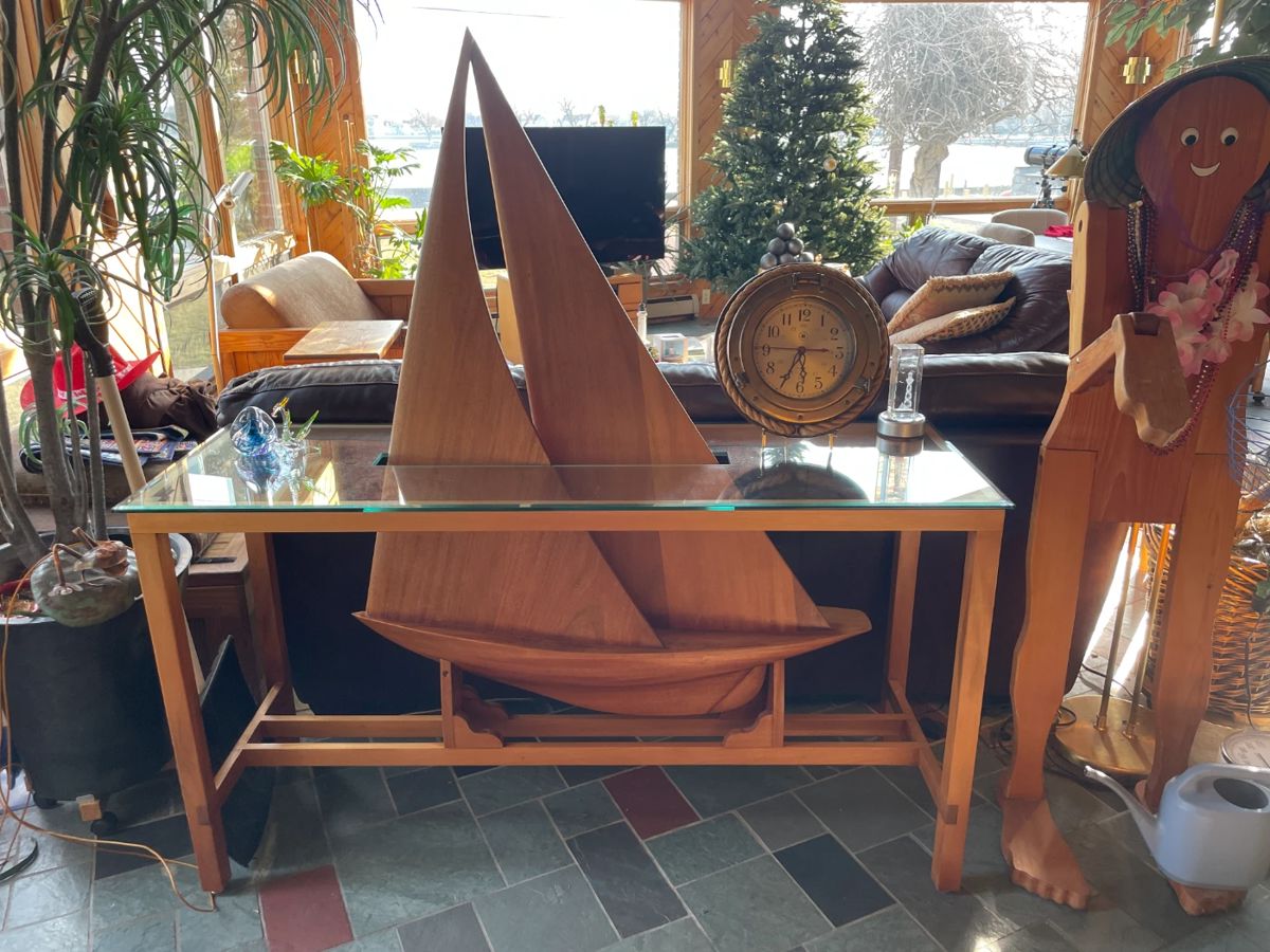 . . . a commissioned sofa table with teak sailboat -- one-of-a-kind statement pieced -- magnificent