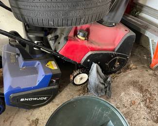 . . . two snow blower -- electric and gas