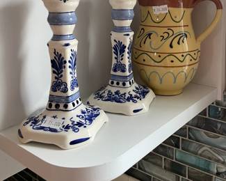 Candlestick holders and pitcher.