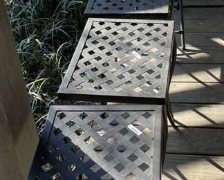 Assorted metal tables. 
